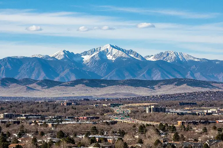 Snowcapped Rocky Mountains near Lakewood Colorado with open trails, parks, and outdoor recreation opportunities year-round